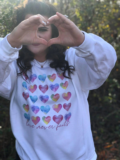 Love Never Fails Sweatshirt