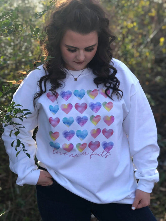 Love Never Fails Sweatshirt